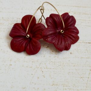 Hibiskusy na złotych kołach czerwone
